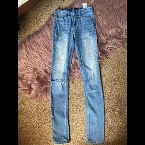 hollister high rise super skinny denim jeans .